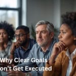 People from diverse backgrounds looking thoughtful in a professional setting, representing the challenge of turning clear goals into consistent execution